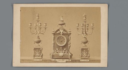 Clock with two candelabras, advertisement for clockmaker Quetscher in Paris