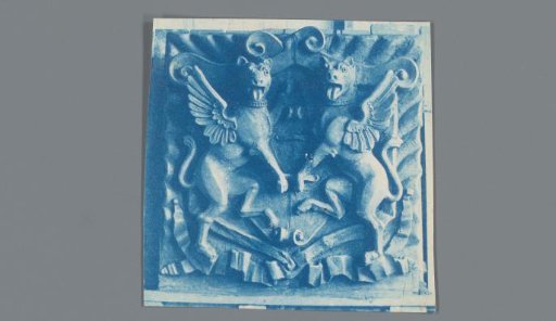 Photographic reproduction of a terracotta sculpture with two winged dogs, an ornament produced by the Boston Terracotta Company
