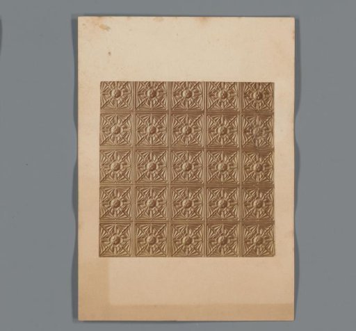 Photographic reproduction of embossed tin ceiling plates with a floral motif by Thomas S. Dixon & Sons