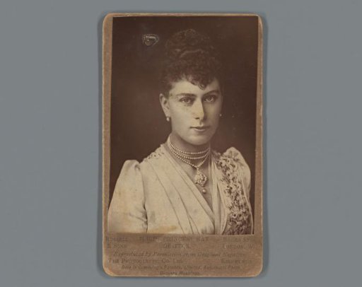 Reproduction of a portrait of Mary of Teck, advertisement for golf balls produced by the North British Rubber Company