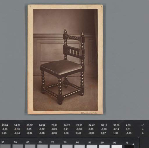 Advertisement for wooden furniture by Odell with a view of a chair