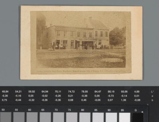 Advertisement for office supplies from Aldridge's post office in Hudson with a view of the post office