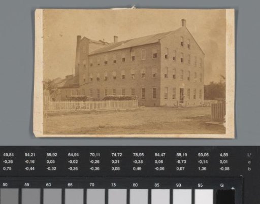 Advertisement for a wool spinning mill at Lewistown, with view of the factory there
