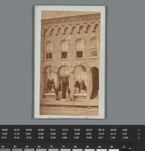 Advertisement for grocery store H.P. Parmelee in Reading with a view of the shop