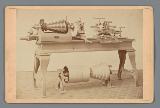 Lathe on a cast-iron table, produced by the American Tool and Machine Company