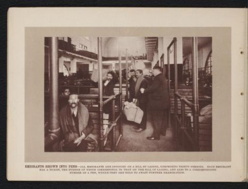 Migrants being escorted to the waiting room for medical inspection for admission to the United States