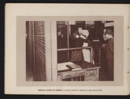 Two Unknown Women Embracing at the Immigration Gate in New York