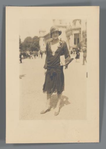 Woman in a park or at a castle (?)