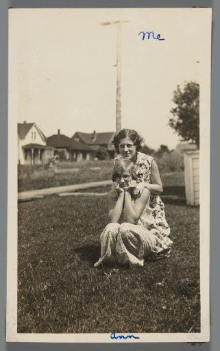 Portrait of two young women in a field