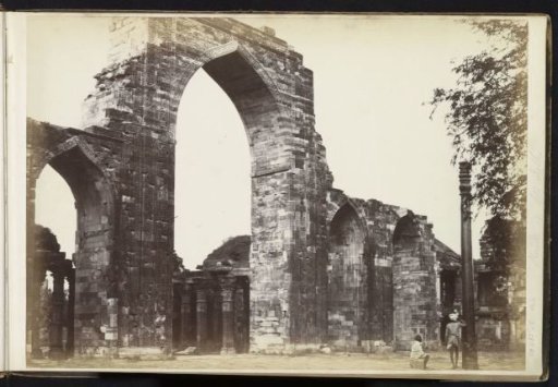 Iron Pillar and the ruins of the Quwwat-ul-Islam mosque, Delhi, India
