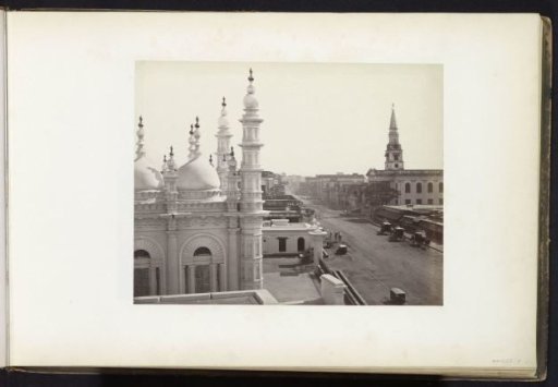 Dharamtala Street with the Tipu Sultan Shahi Mosque and the Roman Catholic Sacred Heart Church on the right, Kolkata, West Bengal, India