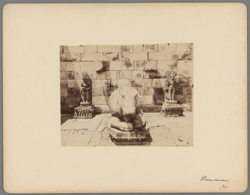 Three sculptures near a temple on the Prambanan temple complex