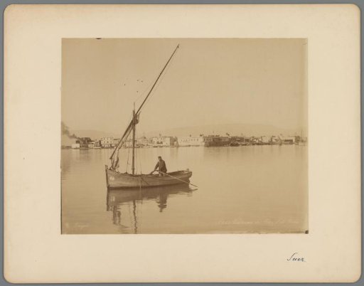 Man in a sailboat near Suez