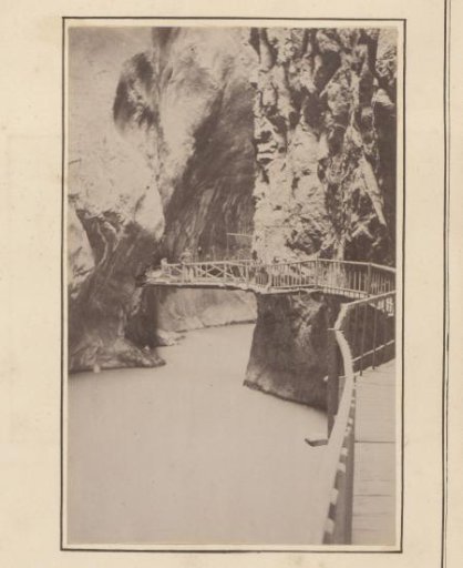 Three men at the Pissevache Waterfall