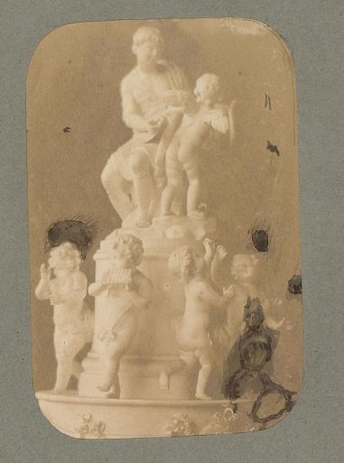 Plaster cast with music-making putti