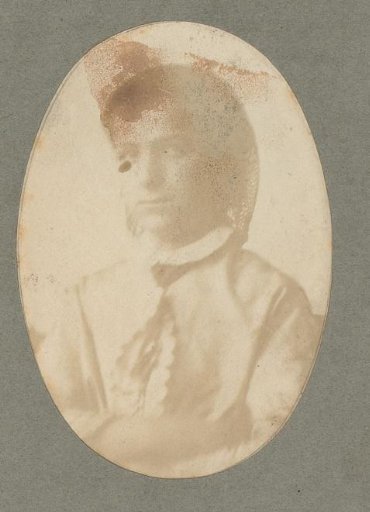 Portrait of a young woman with a hairnet