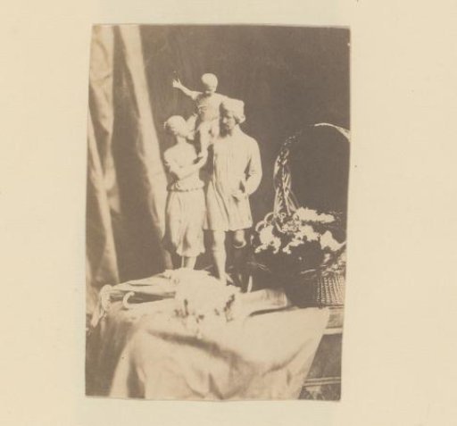 Still life with statuette and basket