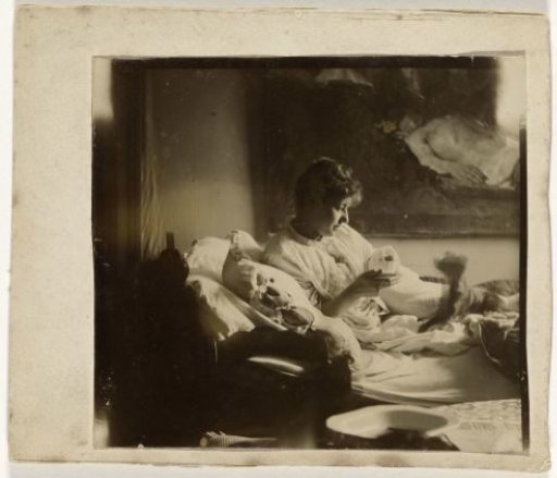 Marie Jordan on a Bed with the Dog