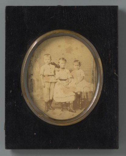 Group portrait of three unknown children