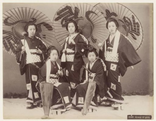 Group portrait of five young unknown Japanese women, all with katana and parasol