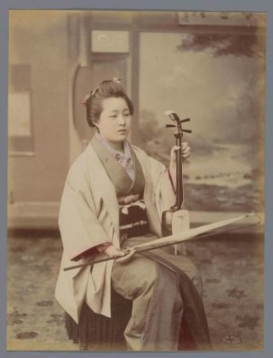 Portrait of an unknown Japanese woman with kokyū