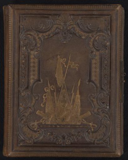 Photo album with music box with 7 photos of British soldiers and a postcard