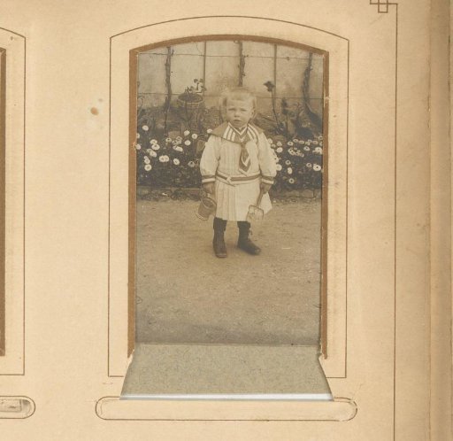 Portrait of a Child with a Bucket and Shovel