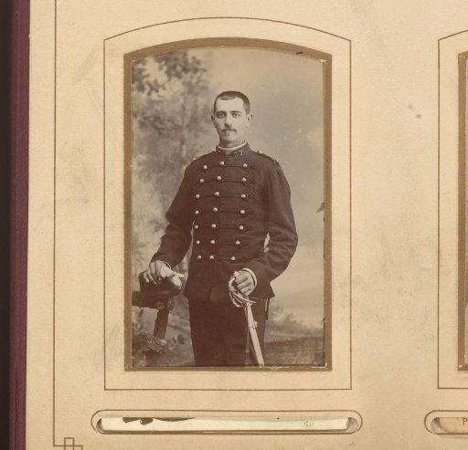 Portrait of a standing man with a sword