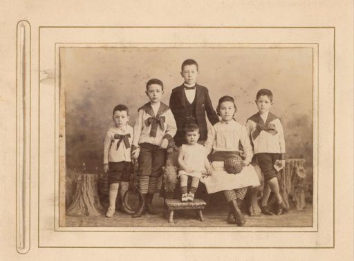 Group portrait of four boys and two girls