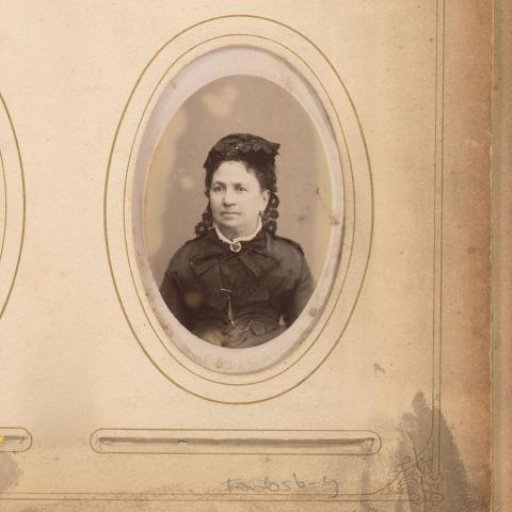 Portrait of a woman with a black lace cap