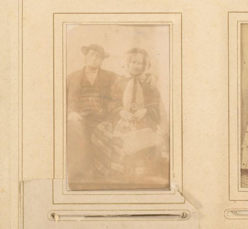 Portrait of a man and woman with hats, the woman with a bag in her hand