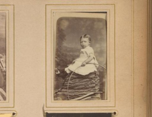 Portrait of a toddler with a hoop