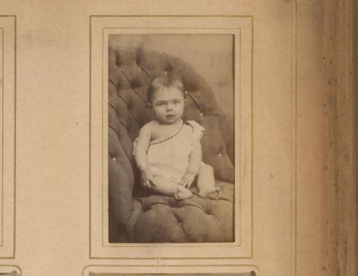 Portrait of a child on a chair
