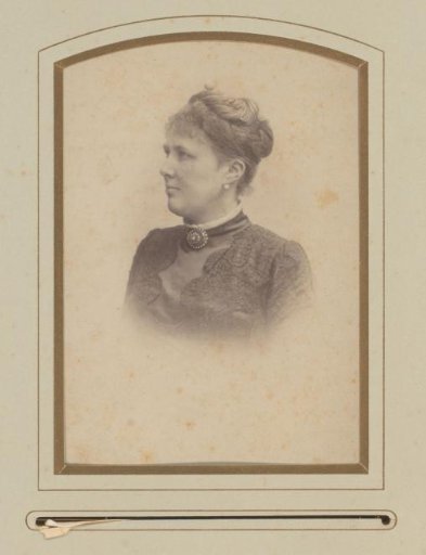 Portrait of a woman in a black lace dress