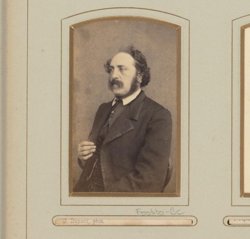 Portrait of a seated man with moustache