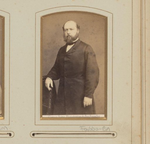 Portrait of a standing man with beard