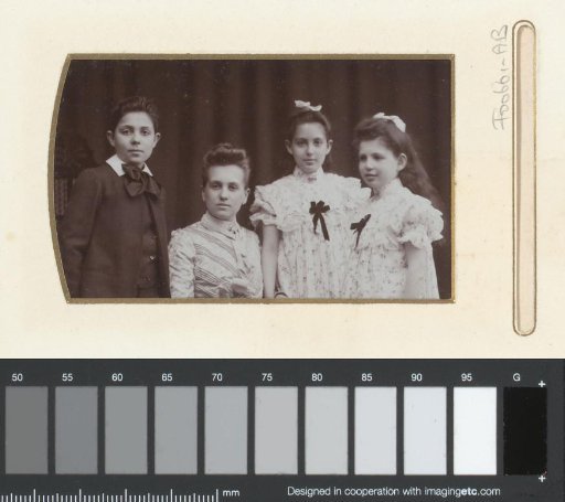 Portrait of a young woman and three children