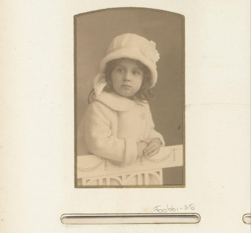 Portrait of a girl with a white hat and jacket