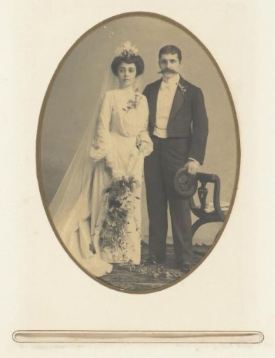Portrait of a standing bride and groom
