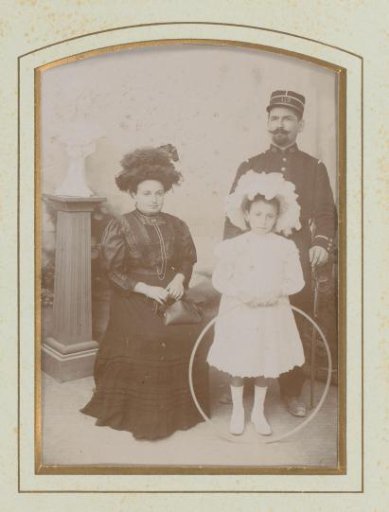 Family Portrait with a Girl Holding a Hoop