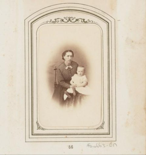 Portrait of a woman with a child on her lap