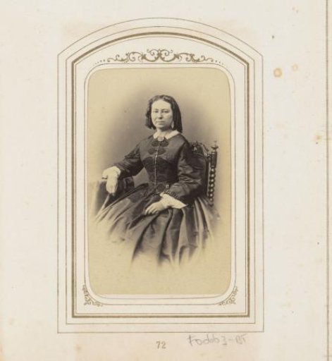 Portrait of a seated woman with ringlets