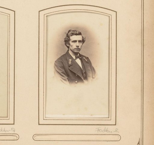 Portrait of a young man with insignia on his coat