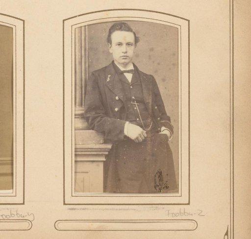Portrait of a young man with insignia on his coat