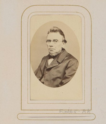 Portrait of a man with a beard and spectacles