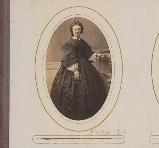 Portrait of a woman with a cap and a book