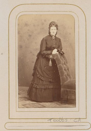 Portrait of a Woman Leaning on an Armchair