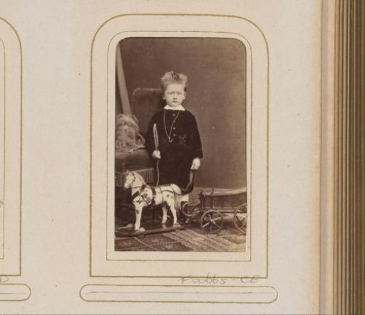 Portrait of a Boy with Dog, Toy Horse and Cart