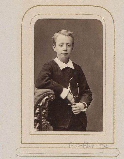 Portrait of a Boy Leaning on a Chair