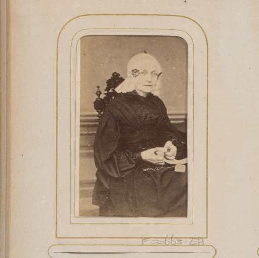 Portrait of an Old Woman with a Frisian Cap, Spectacles and Knitting